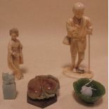 Four jade carvings; a peach, a dragon topped seal, a bowl and another and a Japanese ivory man