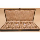 A cased set of twelve European silver tea spoons