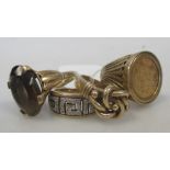 An 1875 half sovereign set in 9ct gold ring, a 9ct smokey quartz ring, a cubic zirconia Greek key