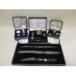 Three cased silver Christening sets and a cased carving set