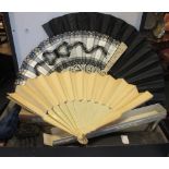 A quantity of fans to include mother of pearl, lace, hand painted examples and others, with
