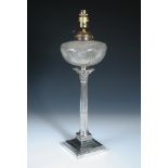 An Edwardian silver table oil lamp standard, by Hawkesworth, Eyre & Co., Sheffield 1907, raised on a