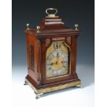 A & H Rowley, London, a late Victorian mahogany bracket clock, the Georgian style case with inverted