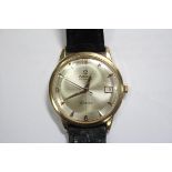 By Omega - an early 1960's gentleman's gold plated automatic wristwatch, champagne coloured dial