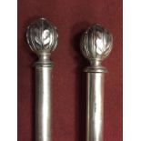 A pair of McKinney & Co. silvered wood curtain poles, with leaf finials 205 x 5cm (80 x 2in)