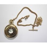 By J W Benson - a 9ct gold half-hunter cased pocket watch, the white enamel dial printed with
