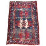 A Caucasian rug, 217 x 127cm (85 x 50in)