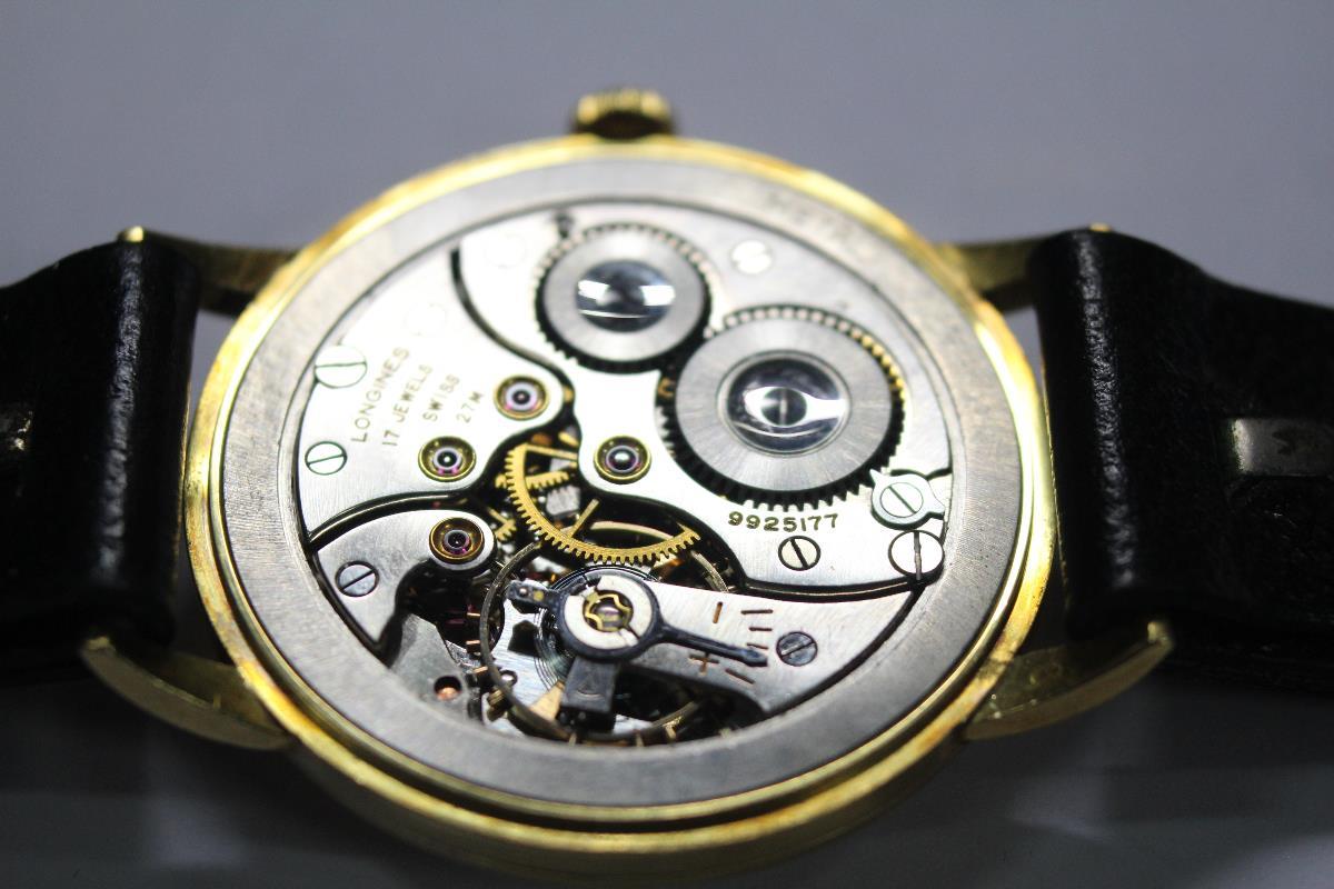 By Longines - a 1950's gentleman's 18ct gold cased wristwatch, the silvered dial with gold - Image 3 of 7