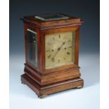 A 19th century rosewood mantel clock, the moulded rectangular case with bevelled glass top and