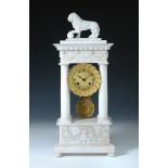 A 19th century French white alabaster portico clock, the case of typical pillar form surmounted by a