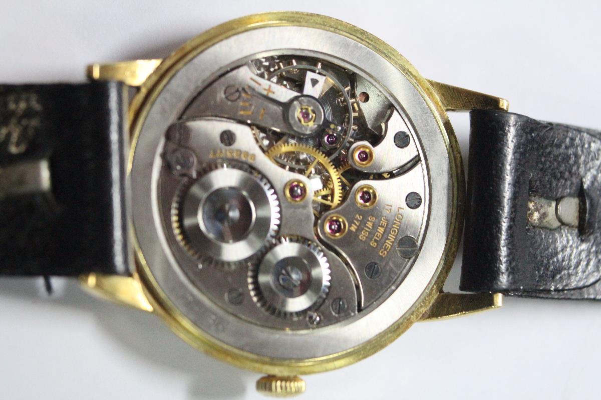 By Longines - a 1950's gentleman's 18ct gold cased wristwatch, the silvered dial with gold - Image 5 of 7