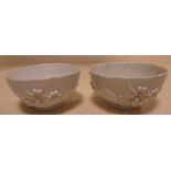 A pair of Bow white glazed chinoiserie bowls