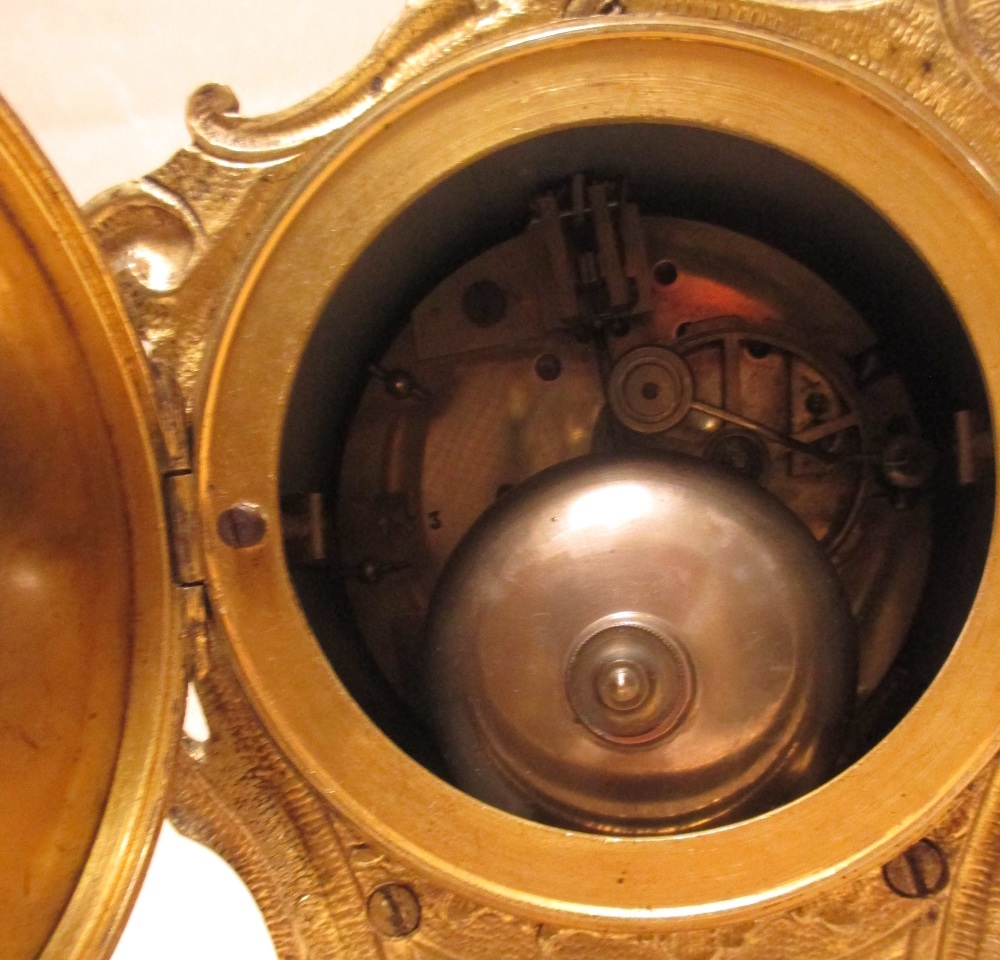 A late 19th/early 20th century French ormolu mantel clock, pendulum and key, 29cm high - Image 2 of 2
