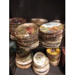 A collection of Wedgwood and other limited edition plates, (approx 120 pieces), (2 shelves)