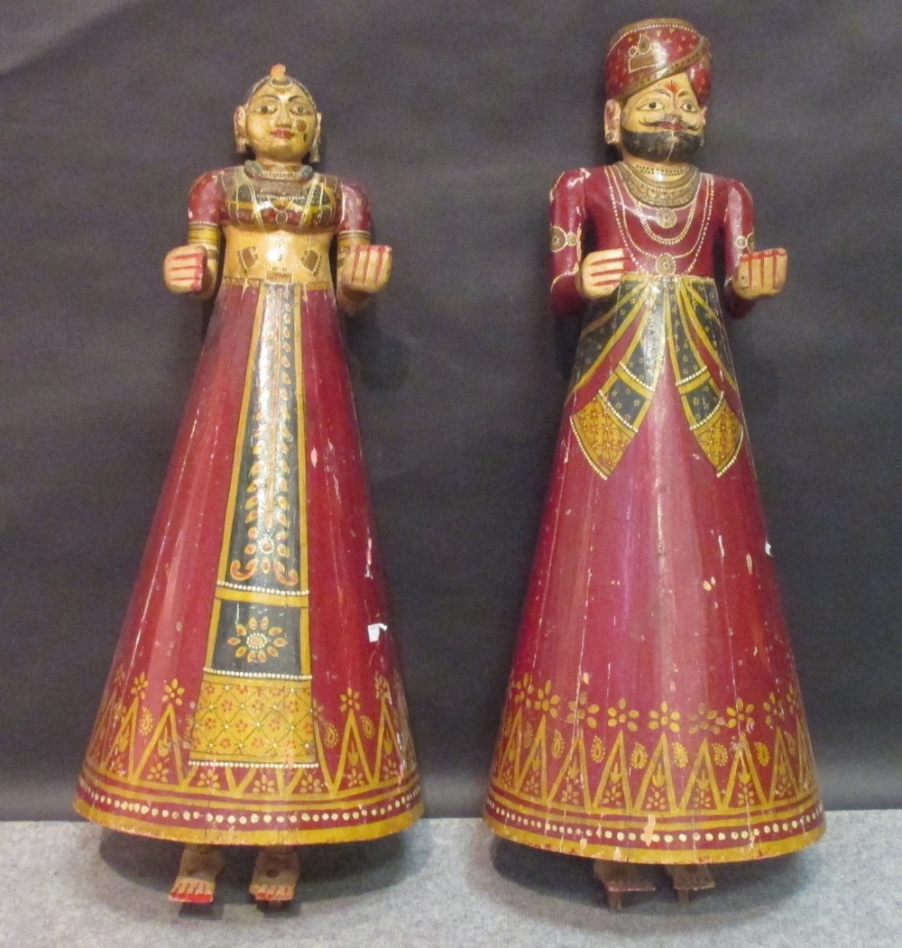 A pair of Kashmiri painted wooden figures, 92cm high