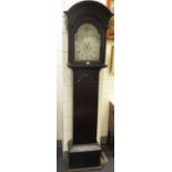 A 19th century long case clock with painted dial in a carved oak case, 214cm high