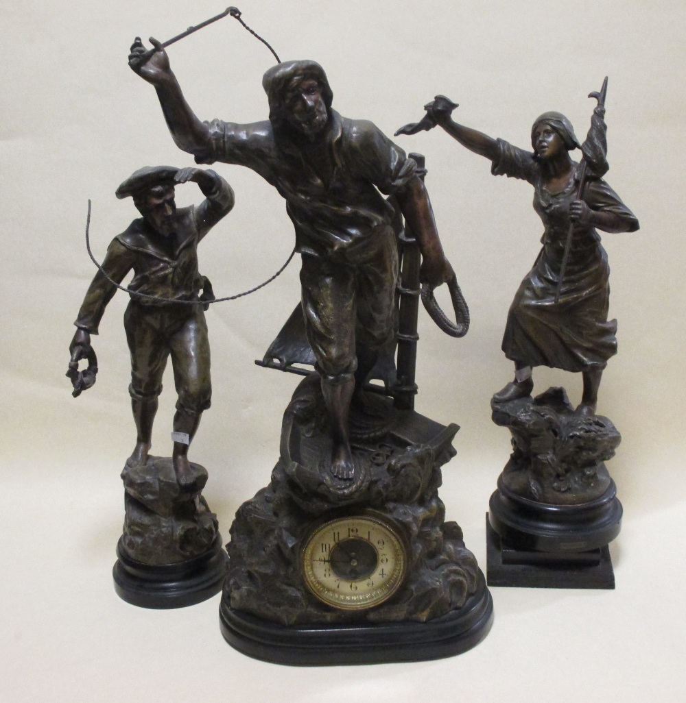 A late Victorian spelter clock garniture of Seafaring subject, the clock figure is 72cm high (3)