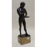 WITHDRAWN A bronze figure of an athlete, 35cm high