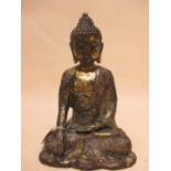 A Tibetan gilt bronze Buddha, 27cm high