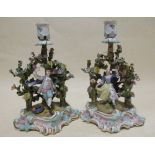 A pair of late 19th/early 20th century Meissen figural candlesticks, 23cm high