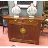 A 20th cenutry Chinese sideboard, 97 x 144 x 46cm