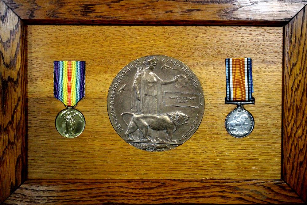 A framed WWI group to G57987 Pte H S Skinner, Middlesex Regiment comprising: Victory Medal and