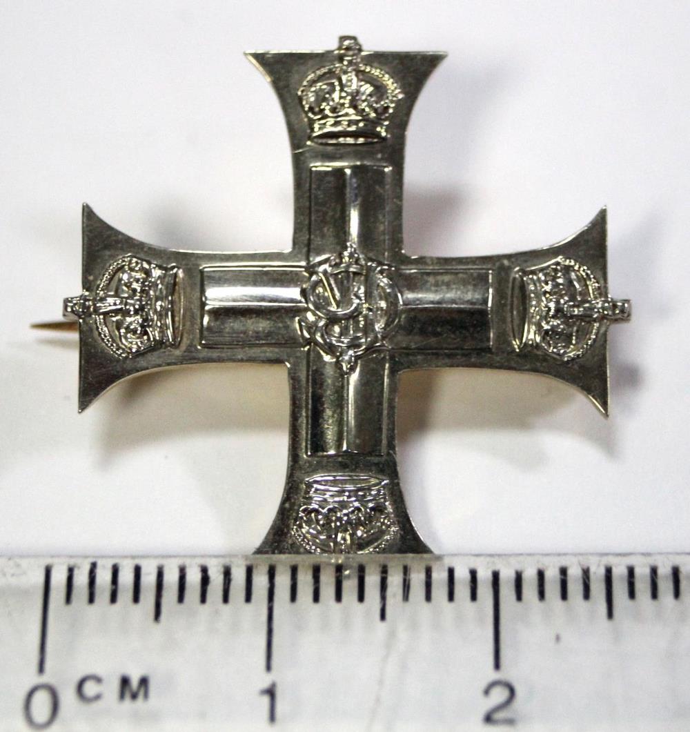A silver and gold coloured brooch formed as a miniature Military Cross, associated with the Military - Image 3 of 4