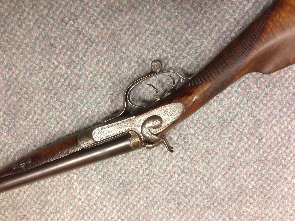 William Ford, a 16 bore hammer gun, No 165 (Barrel No. 12767), with 28" barrels, the frame with