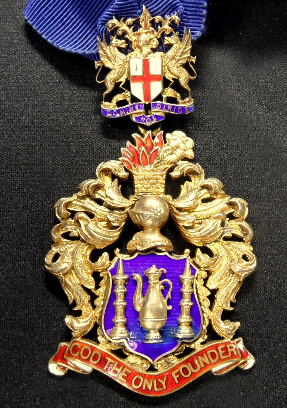 A silver gilt and enamel neck badge of The Worshipful Company of Founders, by Spencer, Birmingham