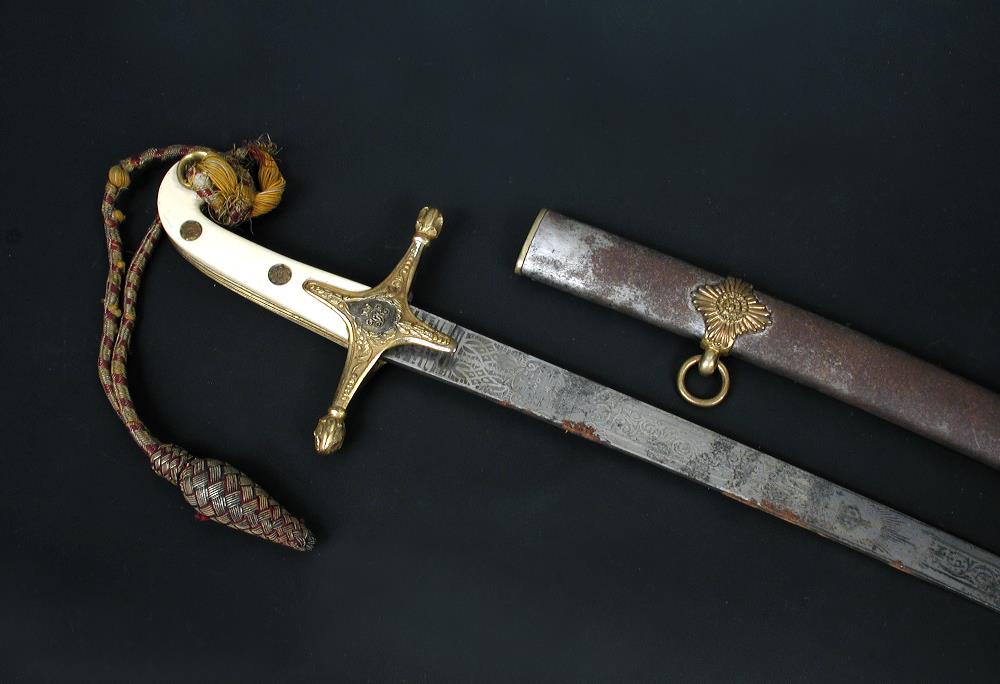 A Victorian officer's Mameluke sword, with ivory grip, etched blade by J B Johnstone, Dawson St,