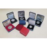 Royal Mint 1989 silver proof £1, a proof 1988 £1, a 2005 proof £1, a 2006 proof £1, a 1989 silver