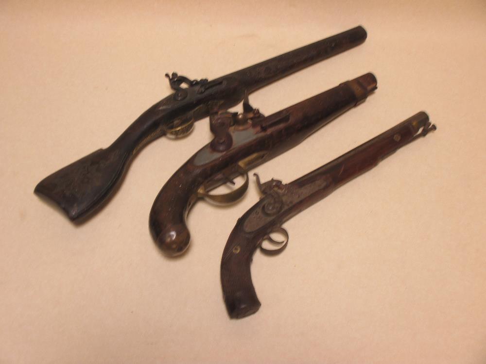 A Tower type flintlock pistol, 45cm; a Continental percussion pistol and an Eastern flintlock pistol - Image 2 of 4