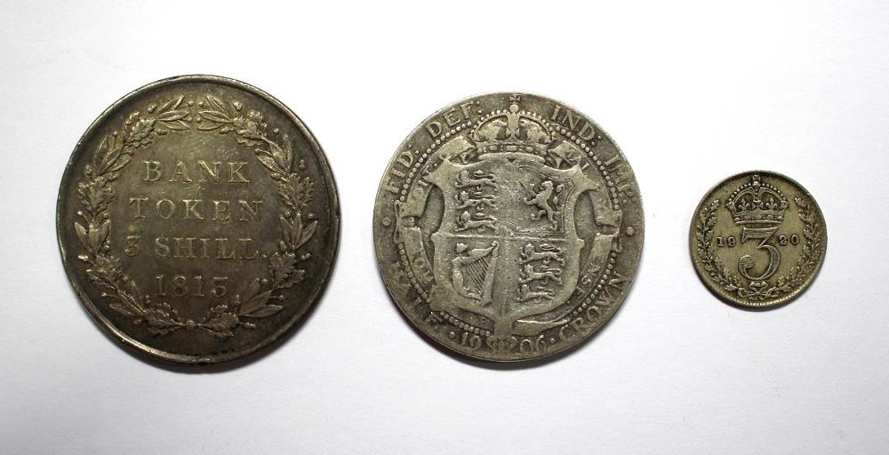 An 1813 three shilling bank token of VF or better together with an Edward VII halfcrown, 1906 and