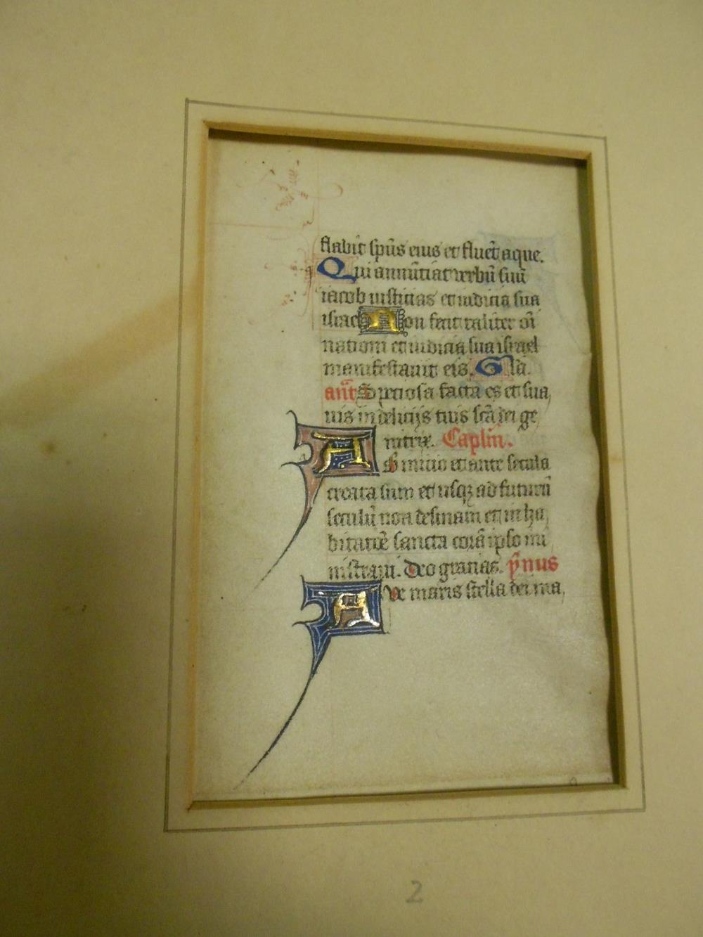 An illuminated Manuscript vellum leaf, highlighted in gilt, with verse with decorative capitals to - Image 2 of 2