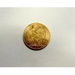 France - gold 20 francs coin, 1909, good/EF, scarce 6.6gm