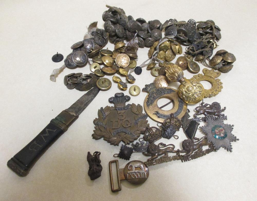 Militaria; a quantity of buttons, a knife etc