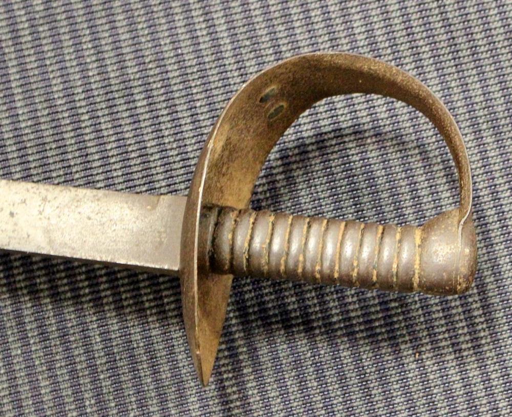 A 19th century naval boarding cutlass, the blade tipped and stamped C/87, solid basket hilt with - Image 2 of 2