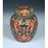 A Moorcroft Flame of the Forest pattern jar and cover, painted and impressed marks, dated (19)97