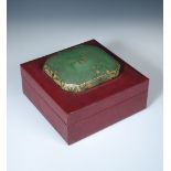 A Daum acid etched and enamelled glass cover, later mounted in a red leather box, the glass