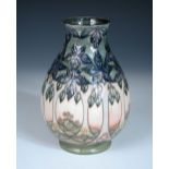 A Moorcroft Cluny pattern vase, the baluster shape with painted and impressed marks 20cm (8in)