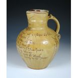 An Edwin Beer Fishley, Fremington jug, the yellow glazed body with sgraffito ears of wheat and