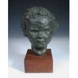 A 20th century bronze portrait head of a young girl, mounted to a hardwood plinth base, unsigned