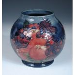 A Moorcroft Finches pattern vase, the globular vase to a blue ground, painted and impressed marks