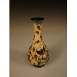 A Moorcroft Hearts Ease pattern vase, the slender baluster form with painted and impressed marks,