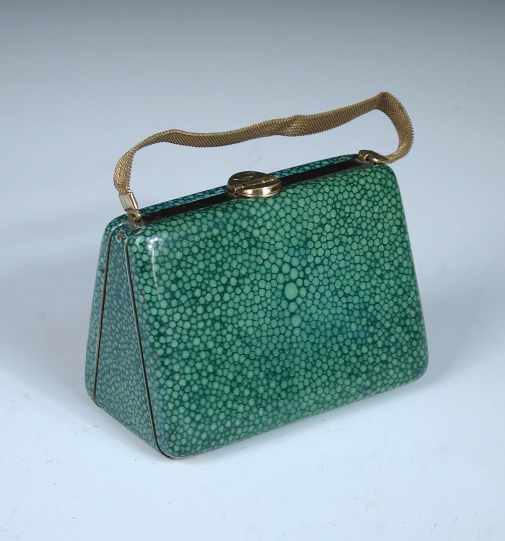 An Art Deco faux shagreen enamel minaudiere, in the form of a rigid metal purse with a mesh chain