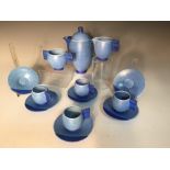 A Carlton Ware 'Moderne' coffee service, circa 1935, the ovoid shaped pieces with wavy handles and