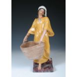 A large Wiener Kunstkeramische Werkstätten Busch and Ludescher pottery figure of a gypsy lady,