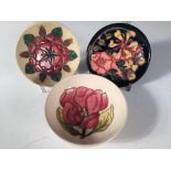 A small Moorcroft trial Rose pattern pin dish, together with a similar dish in the Oberon pattern