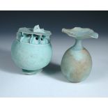 Peter Simpson, two porcelain vases, one modelled as a poppy head, the other of oval form with flared
