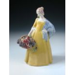 A Wiener Kunstkeramische Werkstätten Busch and Ludescher pottery figure of a lady, modelled